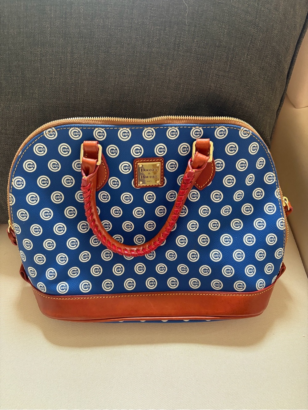 Dooney & Bourke Blue Satchel with Brown Trim and Logo Pattern